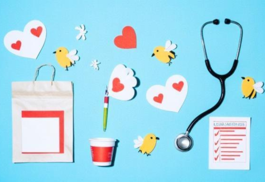 Flat lay illustration on a blue background featuring medical and wellness items including a stethoscope, checklist, paper bag, cup, pen, hearts, and small birds.